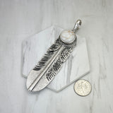 PD251130-01-BLUE                 Silver metal with blue turquoise stone feather Pendent