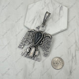 PD251130-02-BLUE                      Silver metal with blue turquoise stone Eagle Pendent