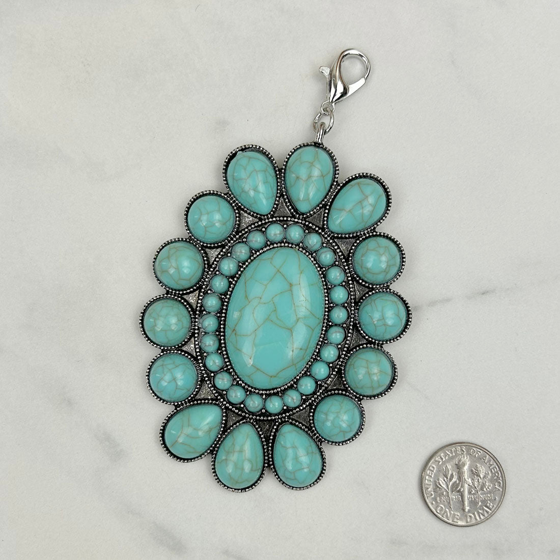 PDS180131-02-BLUE       silver with blue turquoise stone oval concho pendent