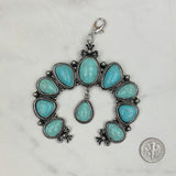 PDS180331-01-BLUE          silver with blue turquoise stone squash blossom pendent
