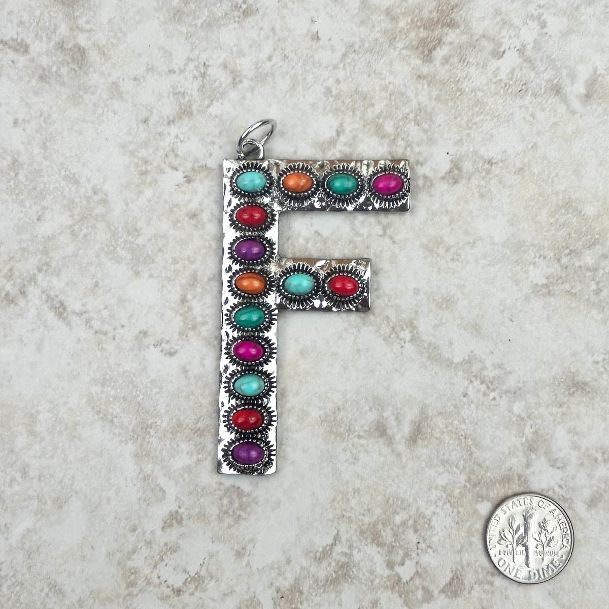PDS230703F-BLUE	Silver with blue turquoise stone letter F pendant