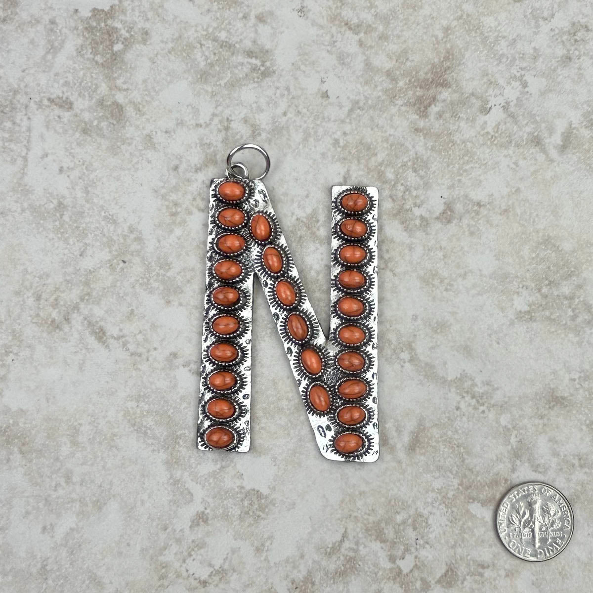 PDS230703N-ORANGE  	Silver with orange stone letter N pendant