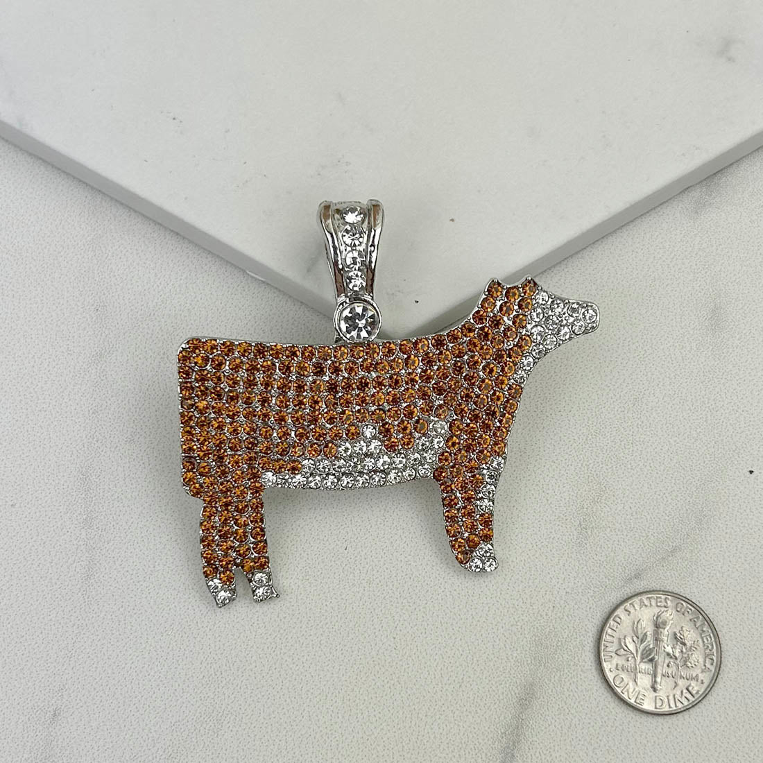 PDS230815-14        Silver with brown crystal cow pendent