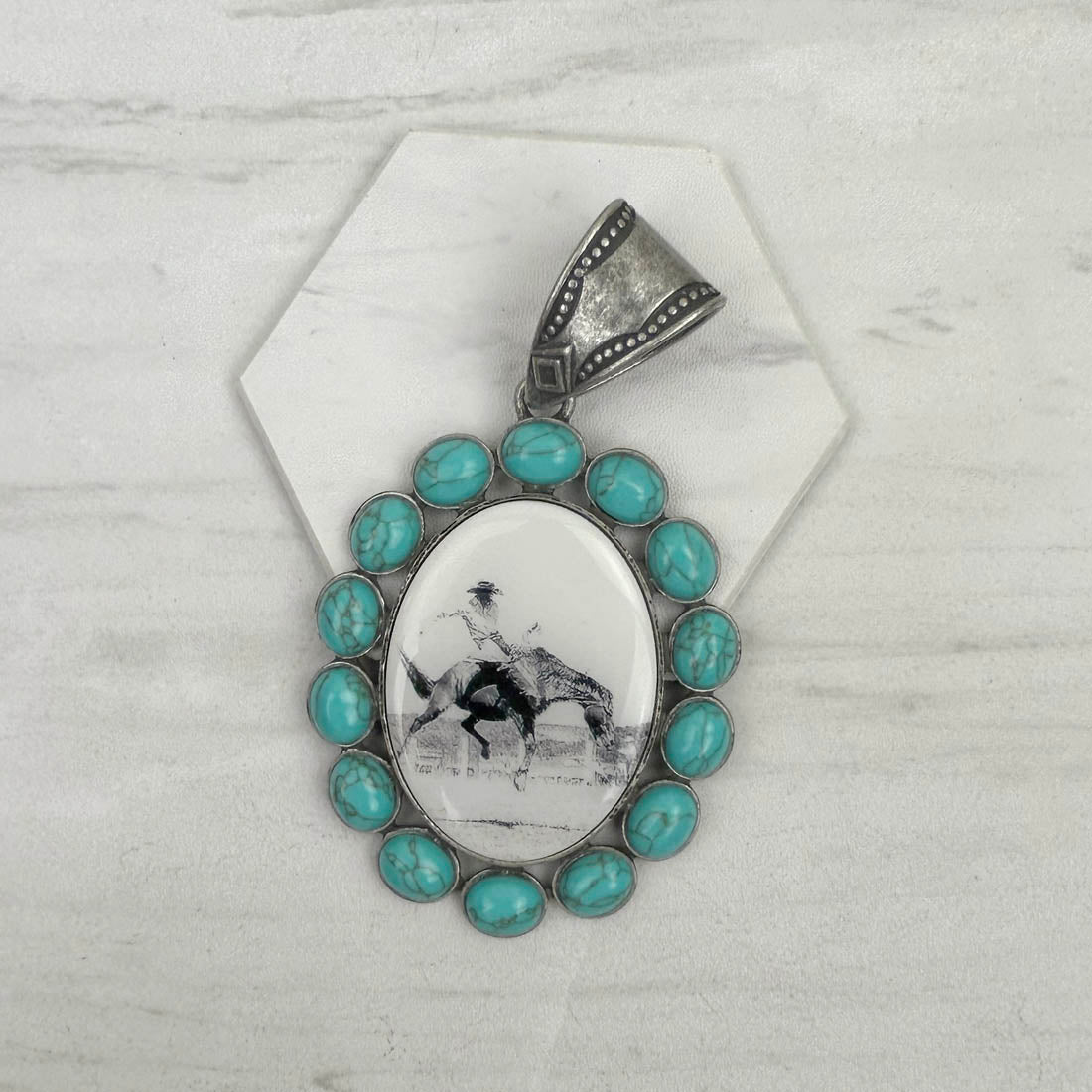 PDS230827-01                  Silver oval with blue turquoise stone cowboy pendent