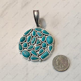 PDS250330-01-BLUE              50mm Round Silver metal with Blue TQ stone Pendent