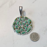 PDS250330-01-BLUE              50mm Round Silver metal with Blue TQ stone Pendent
