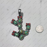 PDS250430-02-BLUE            Silver metal with blue turquoise stone cactus pendent