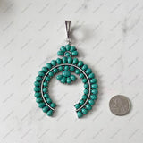 PDS250901-01-BLUE           Silver metal with blue turquoise stone squash blossom pendent