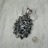 PDS251230-01SL-BLUE                 Silver metal with blue turquoise stone oval flower concho Pendent