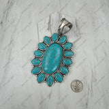 PDS251230-01SL-BLUE                 Silver metal with blue turquoise stone oval flower concho Pendent