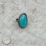 RGS230701-01-BLUE     Silver with turquoise stone oval adjustable Ring