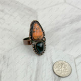 RZ231205-126                Copper metal with black and orange turquoise stone adjustable Ring