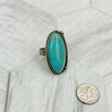 RZ231205-141                 Silver metal with blue turquoise oval stone adjustable Ring