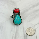 RZ231205-61                  Silver metal with black and orange turquoise stone adjustable Ring