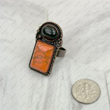 RZ231205-86         Copper metal with black and orange turquoise stone adjustable Ring