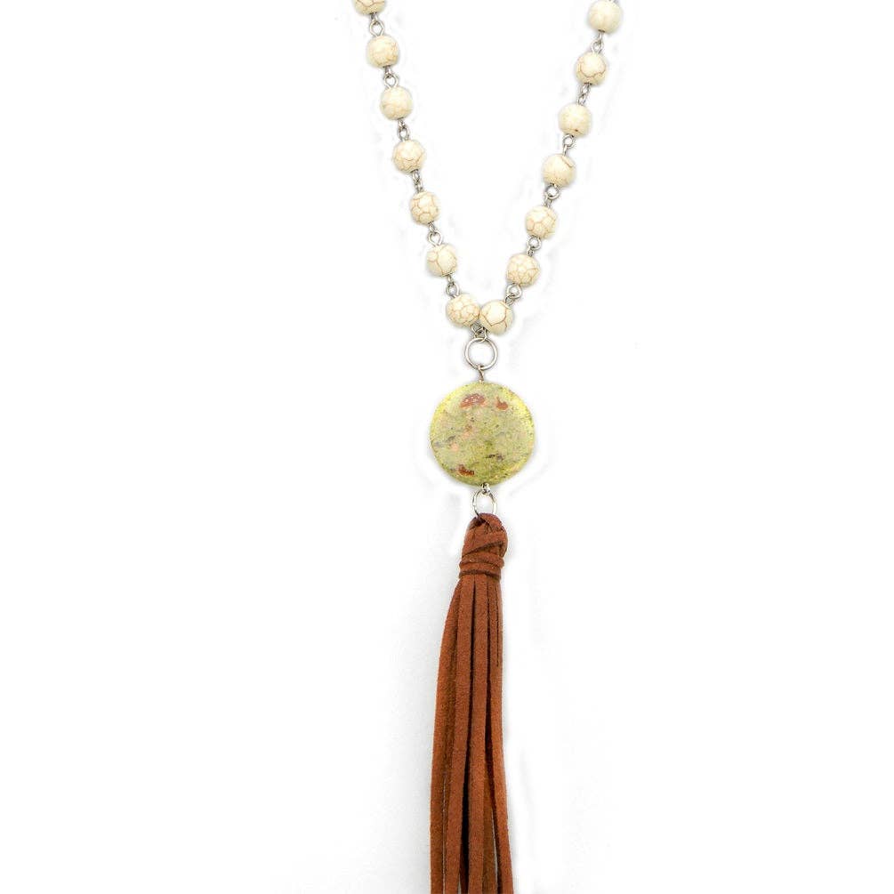 NK160106-13  8MM WHITE TQ BEADS & SUEDE CORD NECKLACE W/8 INCH BROWN TASSEL
